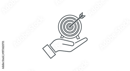 business concept for target achievement and goal success hand holds a bullseye with an arrow representing strategy.