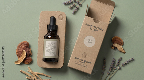 Amber glass dropper bottle in recycled cardboard packaging with herbs  