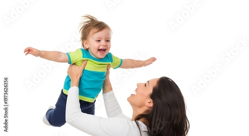 Happy mother lifting her joyful toddler son in the air against a white background.