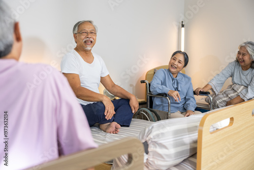 Senior group smile bedroom nursing care retirement family support bonding happiness conversation patient hospital clinic wheelchair friendship together lifestyle relax elderly people community