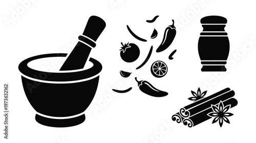 Kitchen spices set with mortar pestle chili cinnamon and star anise.