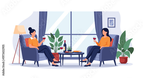 Two female friends enjoy relaxing evening at home sitting in comfortable armchairs while drinking red wine and chatting in modern living room.
