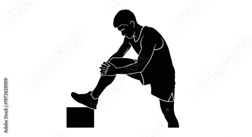 Silhouette of a male athlete stretching his leg on a raised surface.