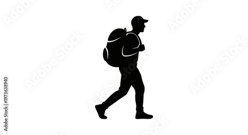 Silhouette of a male hiker with a backpack walking.