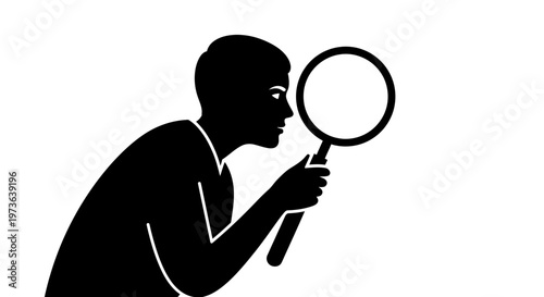 Silhouette of a person intently examining something with a magnifying glass.