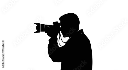 Silhouette of a photographer capturing a moment with a camera.