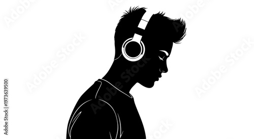 Silhouette of a young man wearing headphones lost in music.