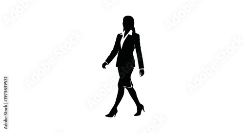 Silhouette of businesswoman in suit walking.