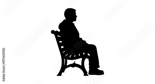 Silhouette of man sitting on chair.