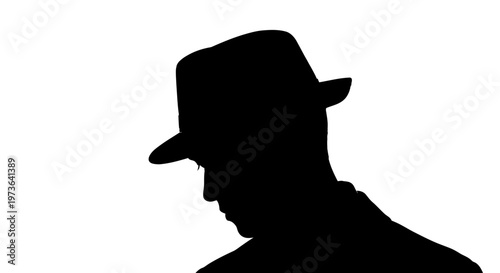 Mysterious silhouette of a man wearing a fedora hat.