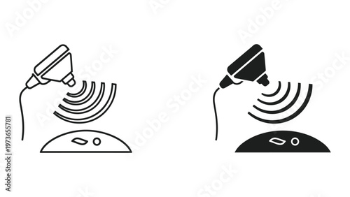 A small black and white robot with antennae actively scanning an object with sensors in a laboratory environment demonstrating advanced robotic technology and automated inspection processes