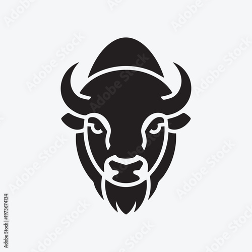Minimalist black silhouette of a bison head with prominent horns