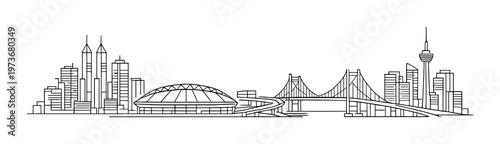 City skyline with stadium, suspension bridge and waterfront