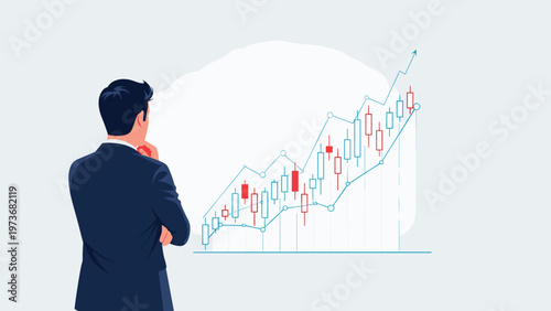 Focused businessman looking at a rising stock market candlestick chart representing financial analysis and successful investment strategies.