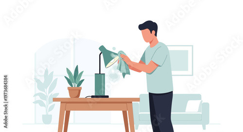 Man cleaning a desk lamp with a cloth in a bright, modern living room