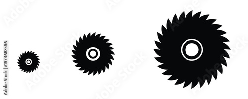 Three black saw blades of different sizes on white background