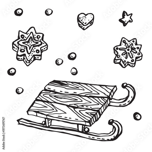 Wooden sled and gingerbread cookies