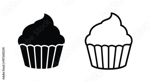 Billede på lærred Two cupcakes one dark and one light presented in a striking silhouette