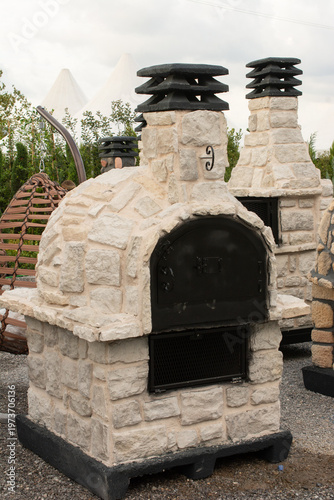 Outdoor Stone Pizza Oven and Masonry Barbecue Fireplace