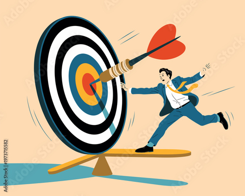 Businessman reaching for a dartboard, symbolizing achieving goals