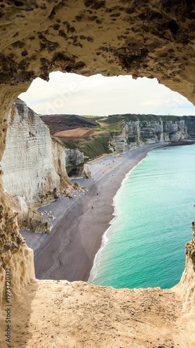 Picturesque coastal limestone cliffs and the English Channel town of Etretat, Normandy, France. High quality 4k footage