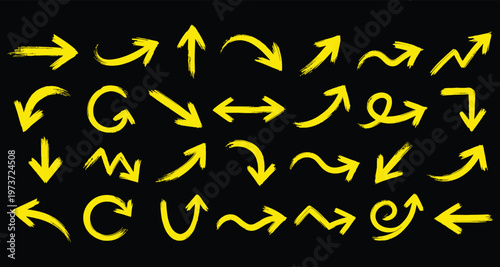 Collection of vibrant yellow arrows and curved lines on a dark black background illustrating direction and movement