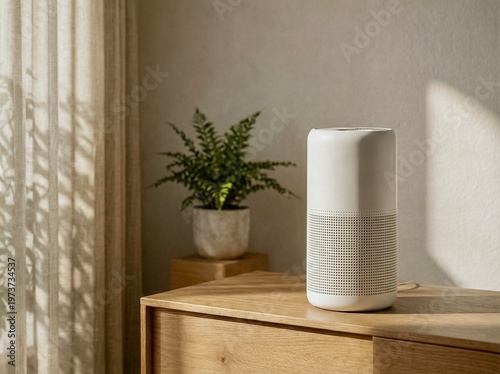 Modern smart speaker in a sunlit Japandi room with morning light and a fern
