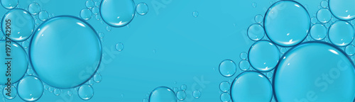 Surface of water with bubbles on blue background