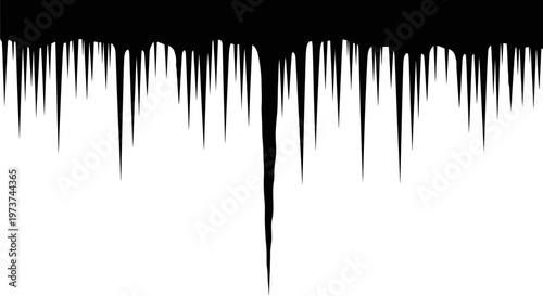 Black paint drips down on white background creating abstract streaks and splatters artistic expression