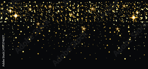 Falling gold confetti with magic light. Falling golden glitter particles.