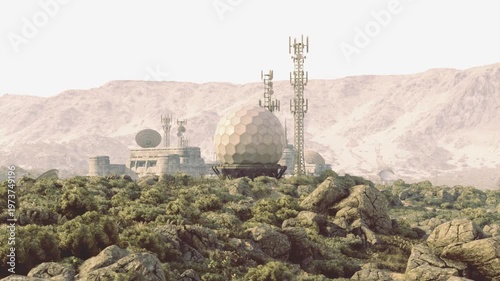 Remote radar dome on rocky hillside, isolated communications facility overlooking scrubby valley and distant mountains with antennas and signal masts bathed