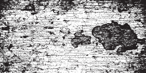 Abstract grungy distressed surface with a chipped paint texture in black and white with high contrast