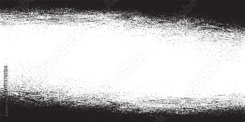 Abstract spray paint texture background in black and white with a wide horizontal band with high contrast