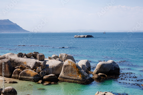 Granite boulders and turquoise ocean at Boulders Beach near Cape Town, South Africa