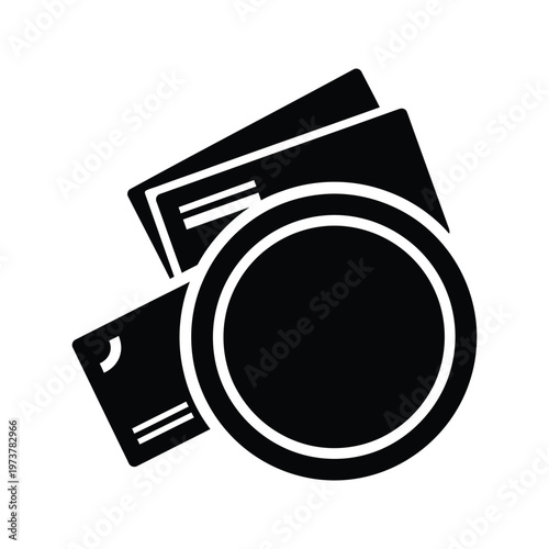 A sleek black camera with a flash and lens cap, perfect for capturing high-quality photos