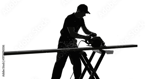 A man is cutting a long piece of wood with a circular saw