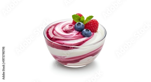 Delicious yogurt dessert with mixed berries and fruit topping in a glass bowl on white background