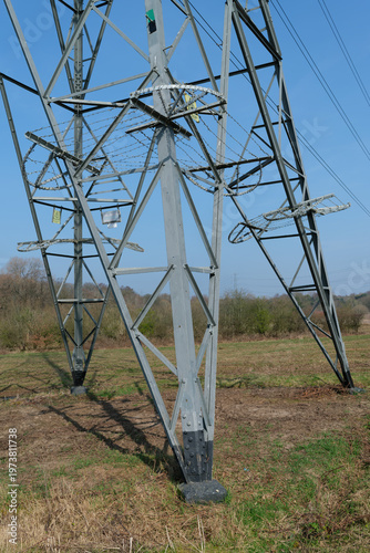 фотографія Electricity pylon foundation with barbed wire security outdoors