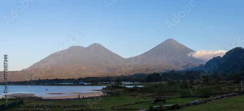 Serene mountain landscape with lake and lush greenery