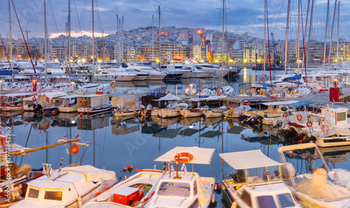 Marina Zeas at blue hour in Piraeus, Greece with yachts