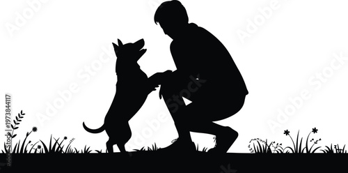 Kneeling pet owner bonding with dog silhouette featuring man training canine friend, animal companionship, and happy lifestyle in grass field.