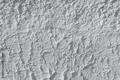 Foto White Stucco Wall Texture with Abstract Relief Pattern
