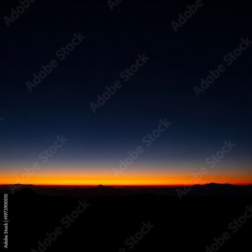 Golden Horizon - A Silhouette of Mountains at Sunset.