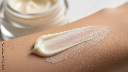 Close-up of cream applied to skin, showing texture and moisturizing effect, skincare concept.