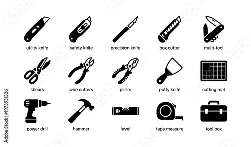 Assorted hand tools collection: utility knives, pliers, power drill, hammer, toolbox