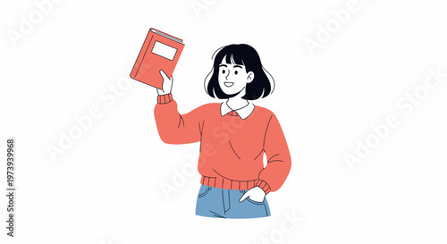 A young woman happily holds up a book.