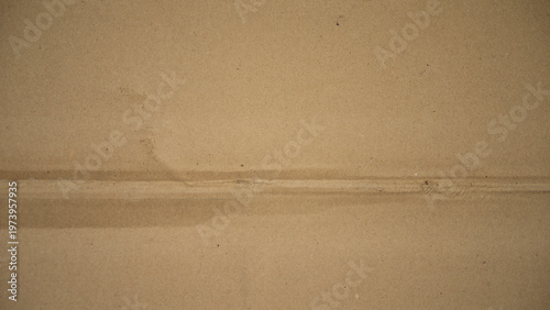 Brown corrugated cardboard texture useful as a background - retro vintage effect