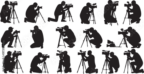 Photographers at work with cameras and tripods in studio