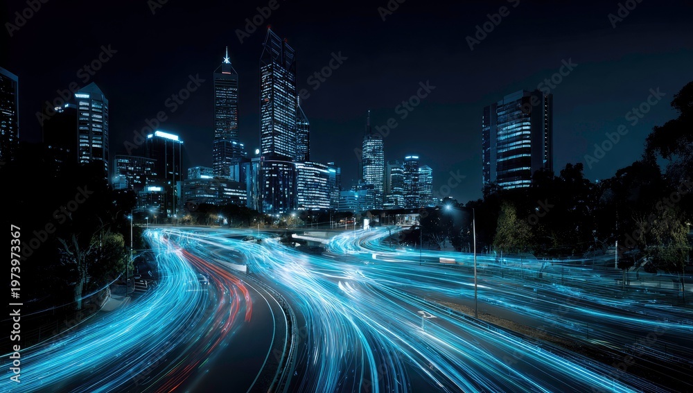 Fototapeta premium Cityscape at Night with Illuminated Roads and Buildings