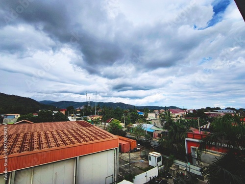 High Angle View of Residential Area Under Dramatic Cloudy Sky